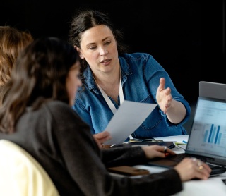Walker xm consultants analyzing walkerxm dashboards for business outcomes