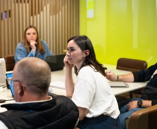 Walker xm specialists listening in conference room